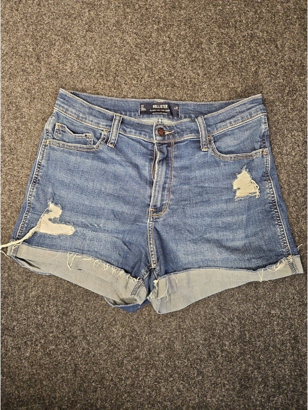 Hollister women's distressed denim shorts in size 12 W31